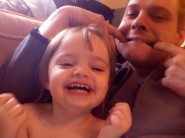 Amelia and Daddy making faces